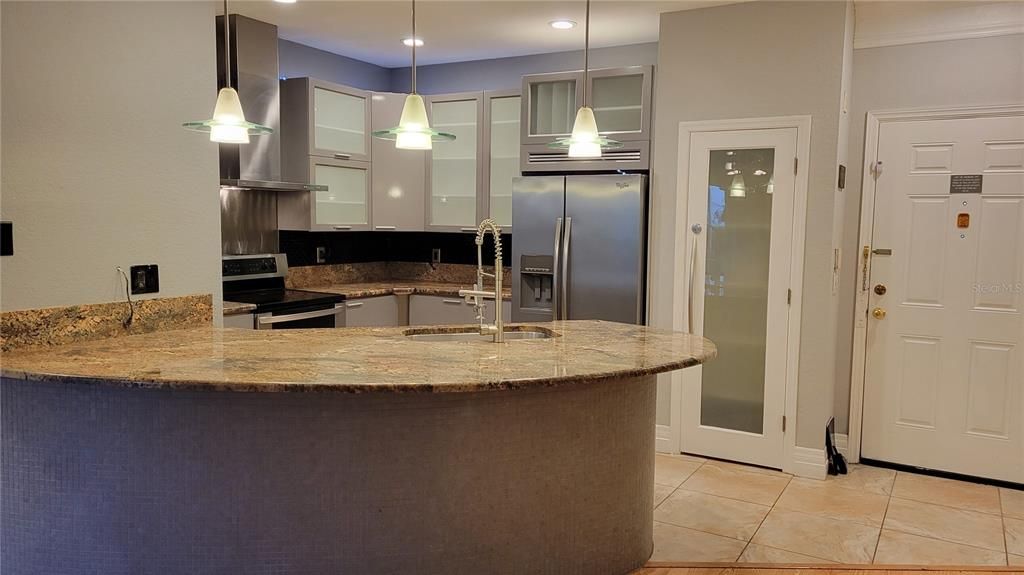 breakfast bar with pendant lighting