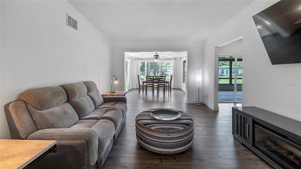 Living room. Beautiful new luxury vinyl plank flooring throughout.