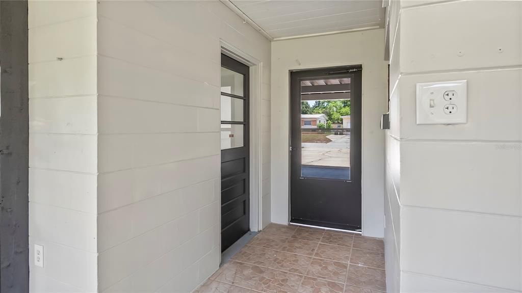 entry from carport to screened lainai