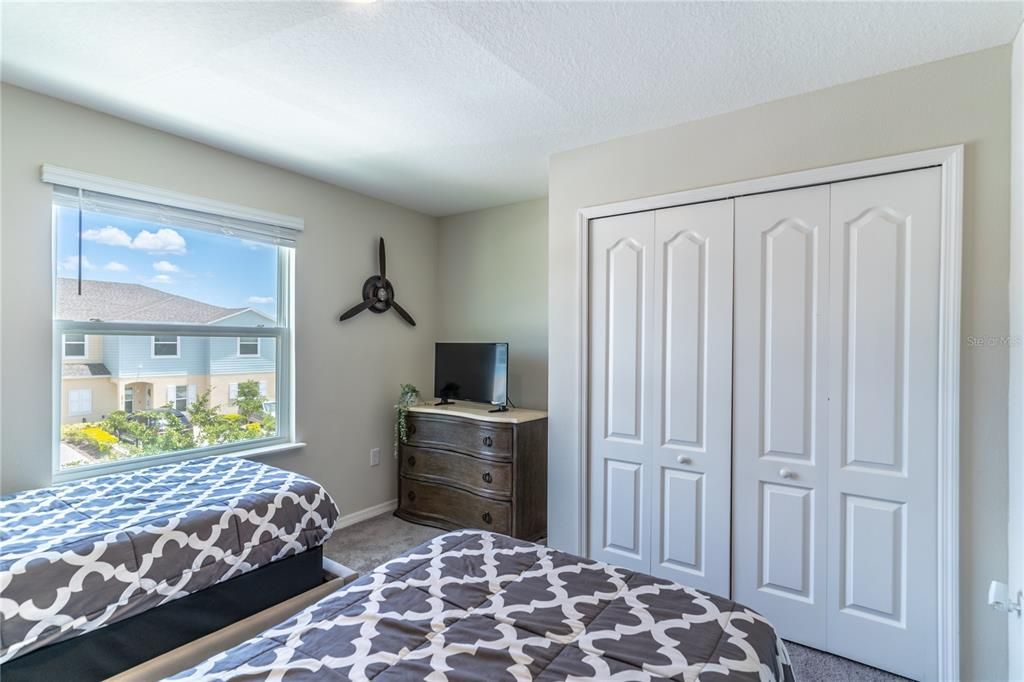 Bedroom three offers recessed lighting and large window