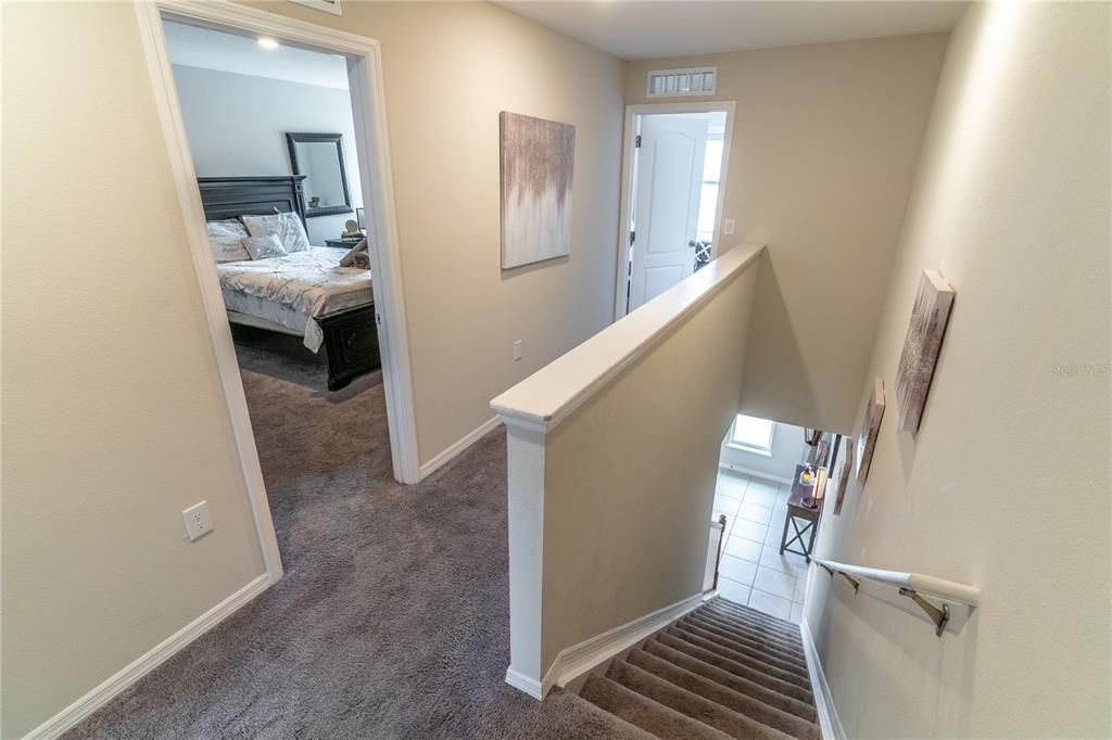 Primary bedroom with recessed lighting