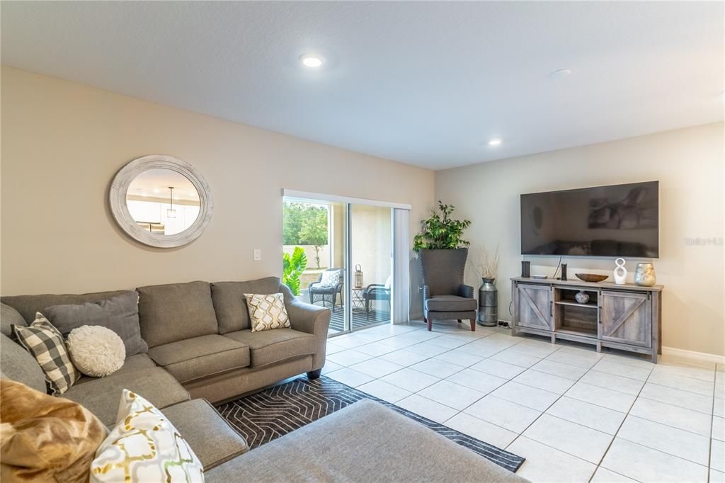 Neutral tile flooring throughout main level