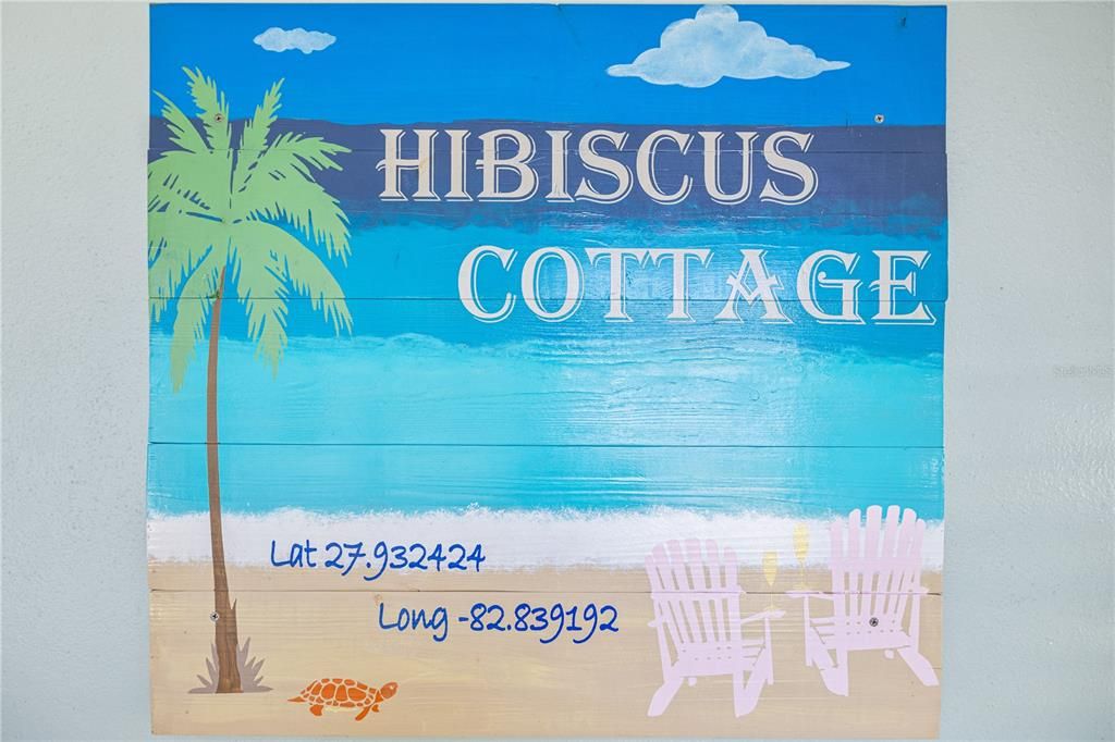 The "HIBISCUS COTTAGE", fondly named by it's current owners. This sign welcomes you and your guests at the front door!