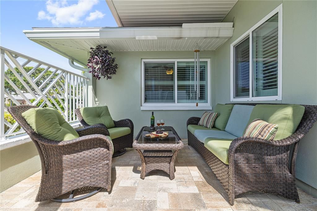 If a covered proch is your style, you can gather on this patio just off of the main living area.
