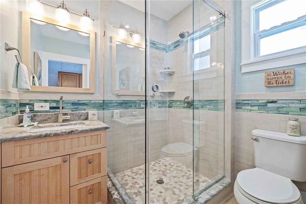 This 3rd bath in the garage, serving as the pool bath, is also great for return trips from the beach or golf course!