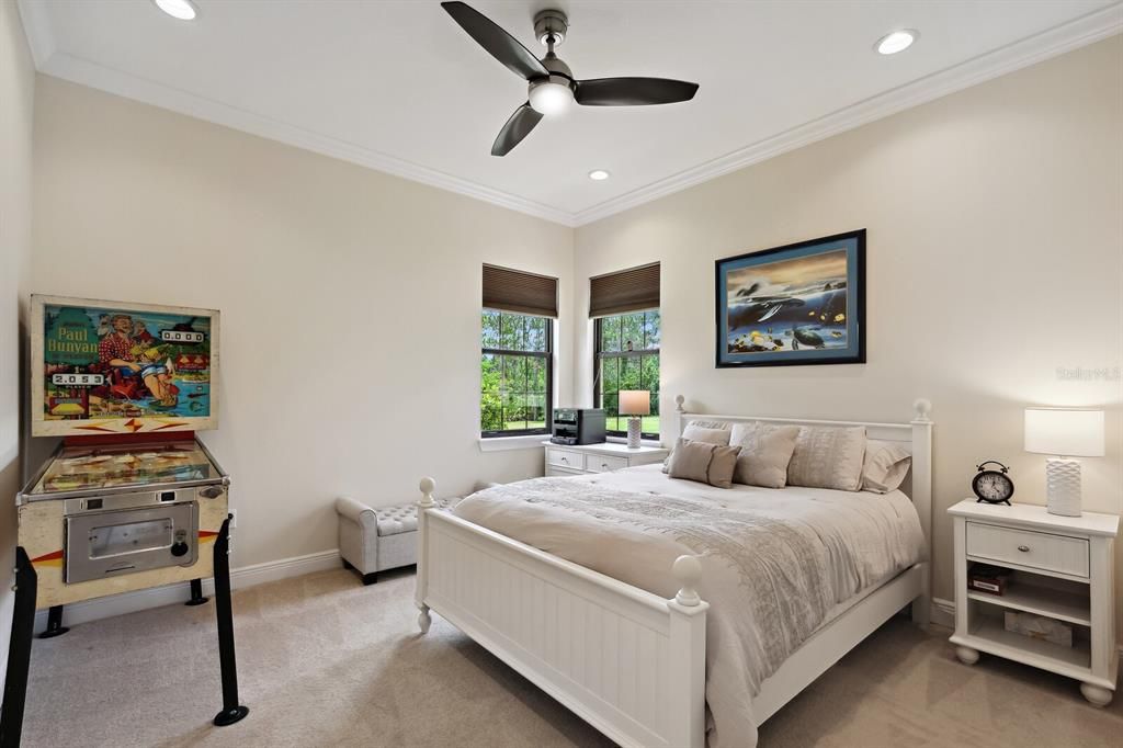 Guest bedroom in main house with walk in closet