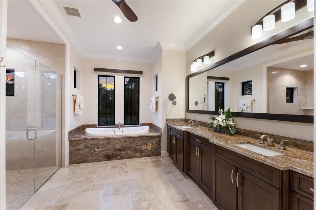 Spa like master bath with Double vanities with gorgeous granite countertops and walk in shower