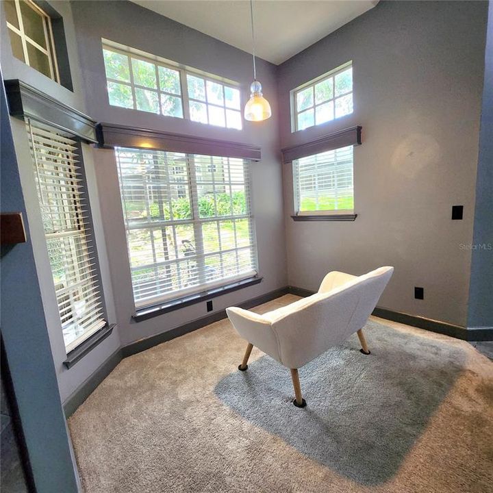 Dining area currently used as sitting area to enjoy view.  Pool within sight to the left.