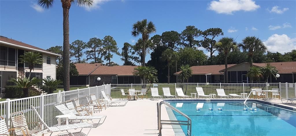 PLENTY OF POOL AND LOUNGE CHAIRS