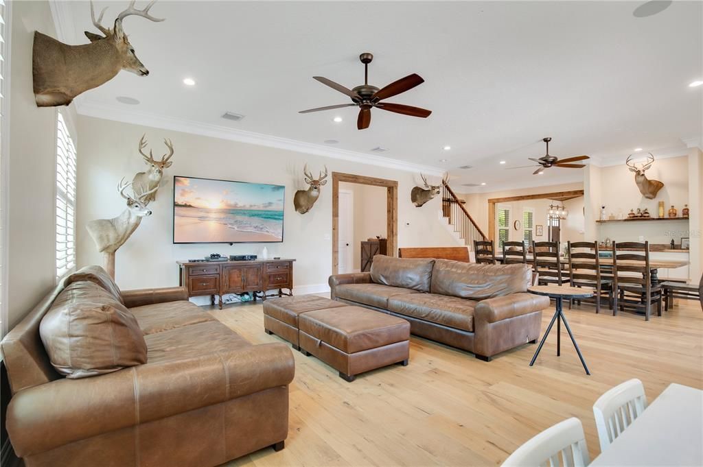 French doors in the great room lead out to the spectacular pool