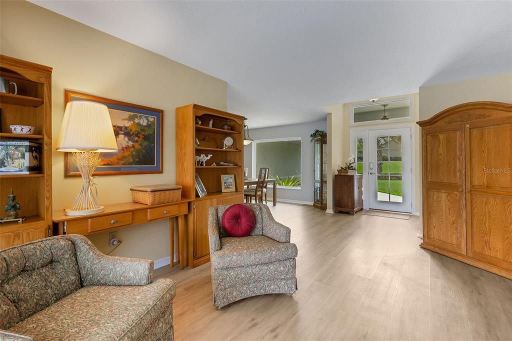 From the living room out toward the front entrance & dining room.