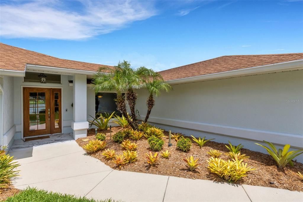 The front walk/ entrance up to the home.