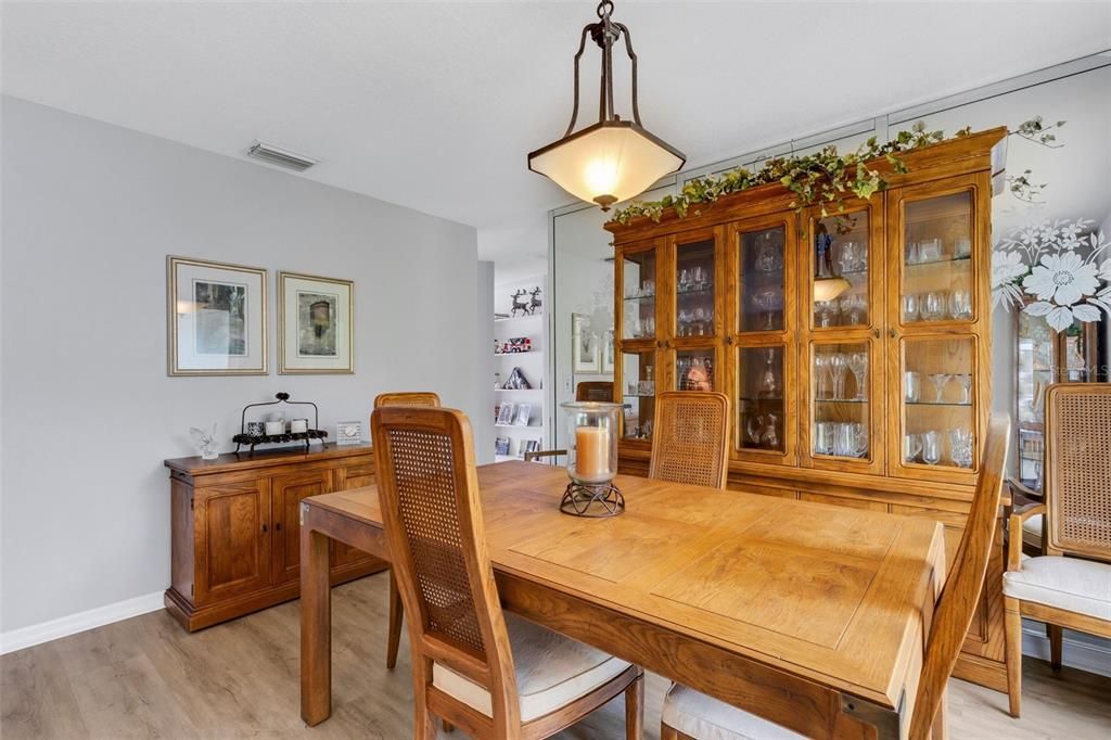 Back in to the dining area and the entrance to the kitchen, family room and 2 more bedrooms