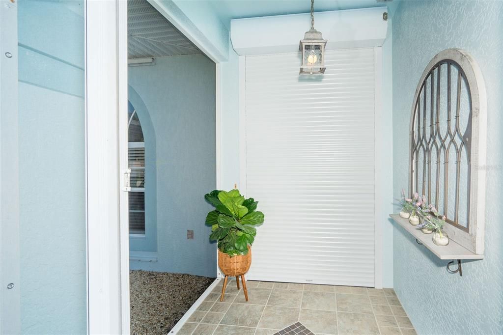 Front entryway with electric rolling shutter down