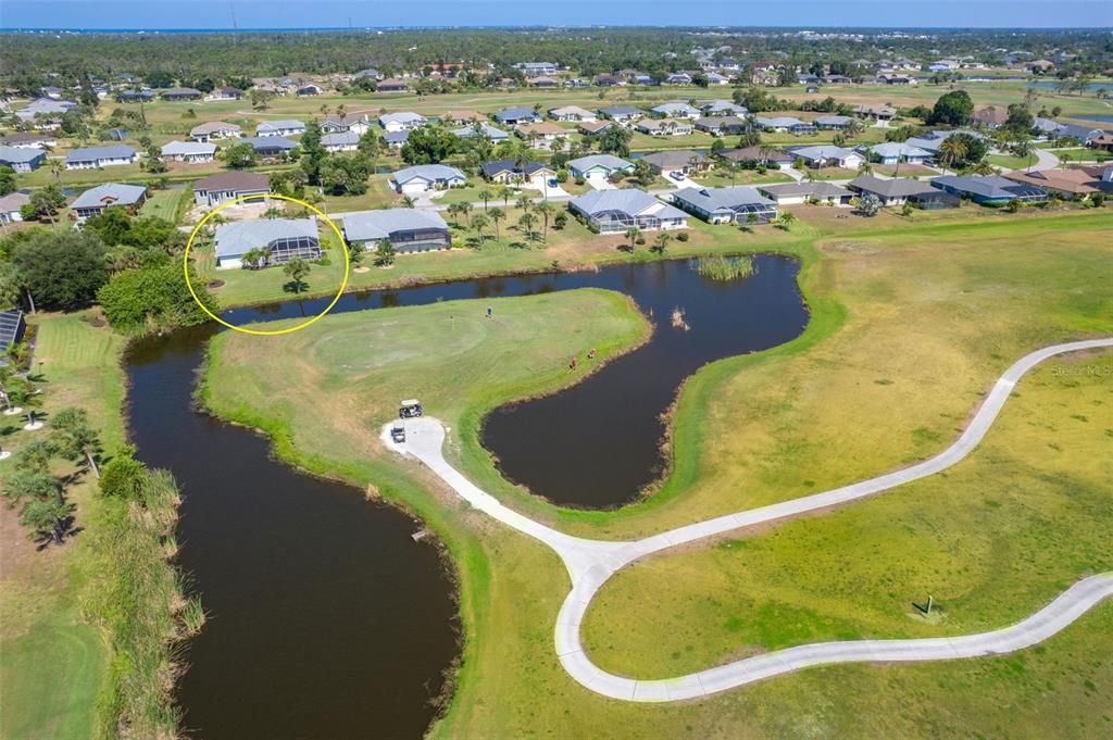 Angle from across Golf Course showing back of home