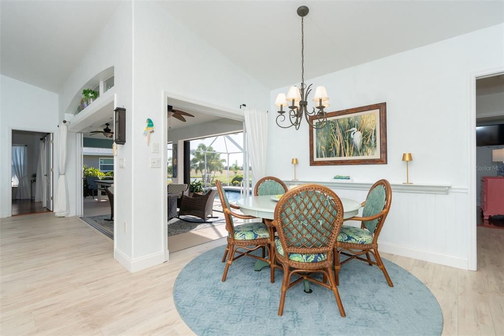 Dining area with view of outside from one of many sliders