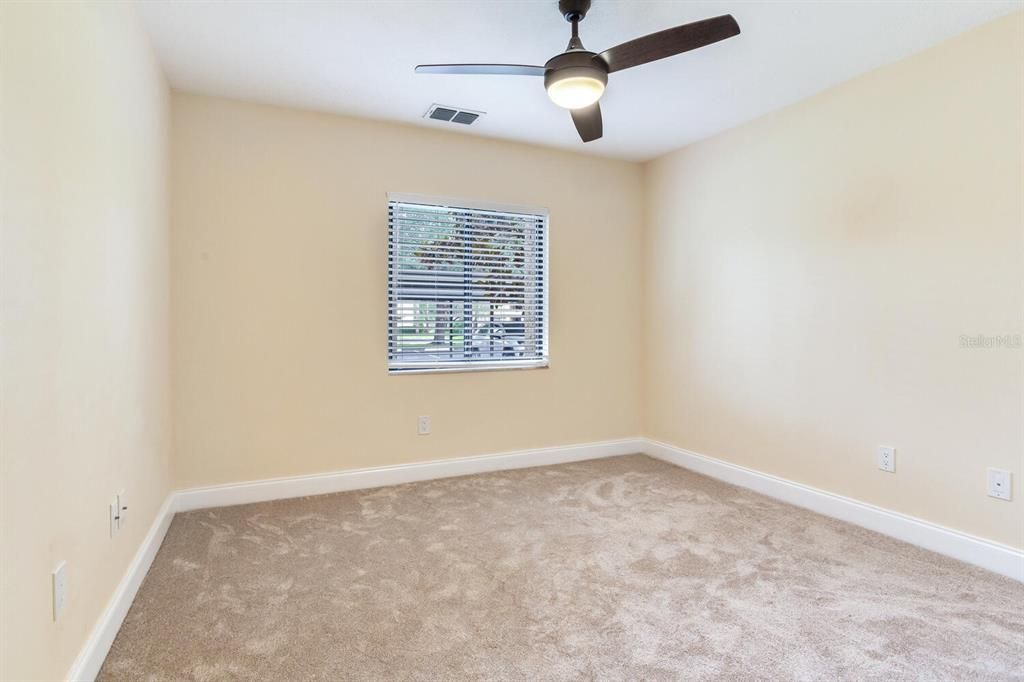 Second Bedroom with new carpet and paint