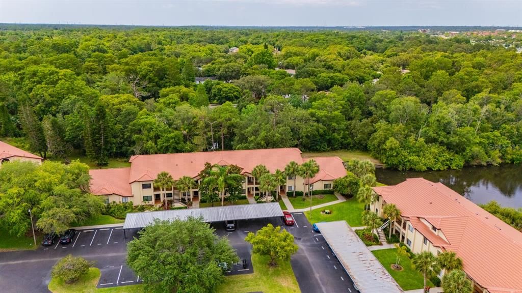 Aerial view of building and carports