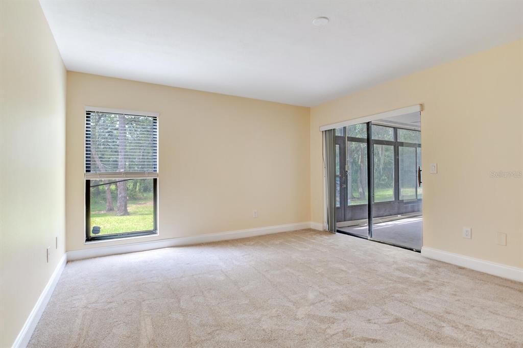 Primary Bedroom with sliding door to patio