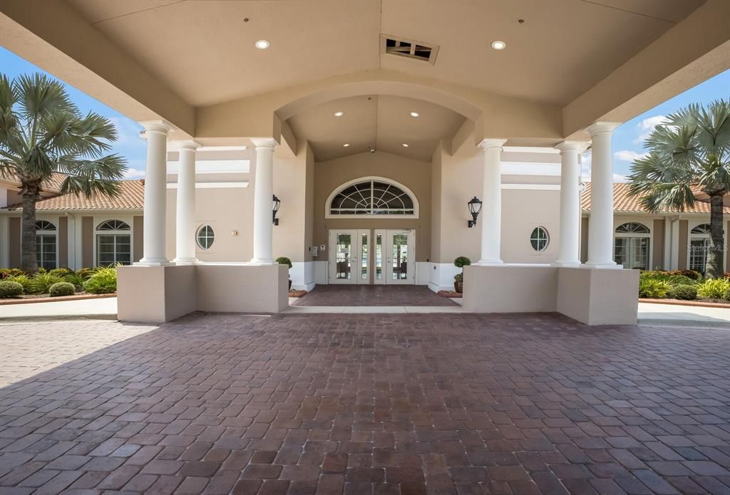GRAND COVERED ENTRANCE TO CLUB HOUSE