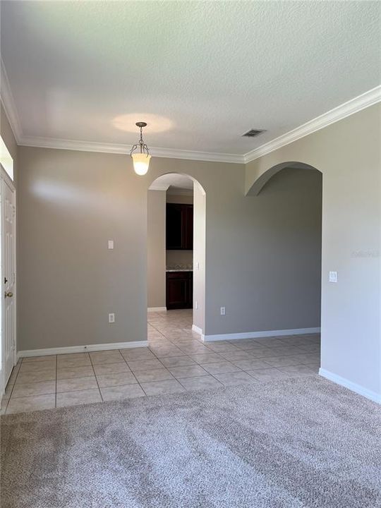 view from Formal living room toward foyer and Kitchen entrance