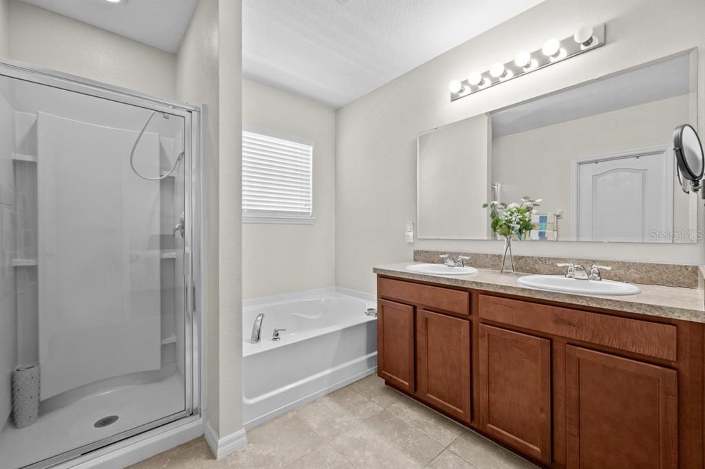 Primary Ensuite with Dual Sinks, Shower and Garden Tub