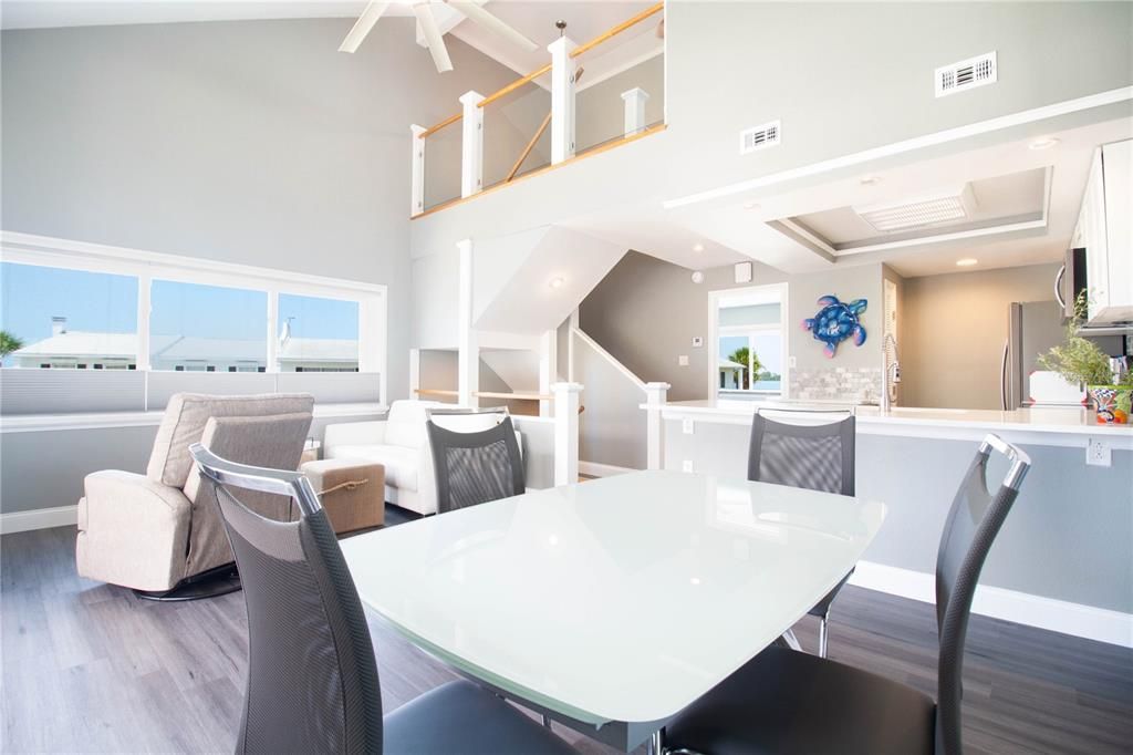 Dining- Living - Kitchen open floor plan and cathedral ceiling