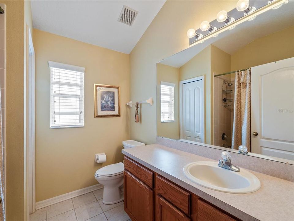 Hall bath with tub shower