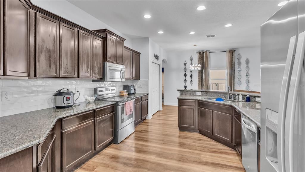 Beautiful Kitchen with plenty of cabinets and space for storage.