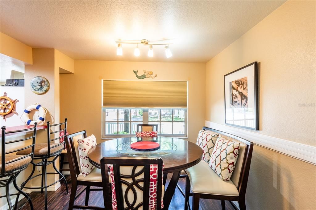 Separate dining area with great view of the pickleball courts.