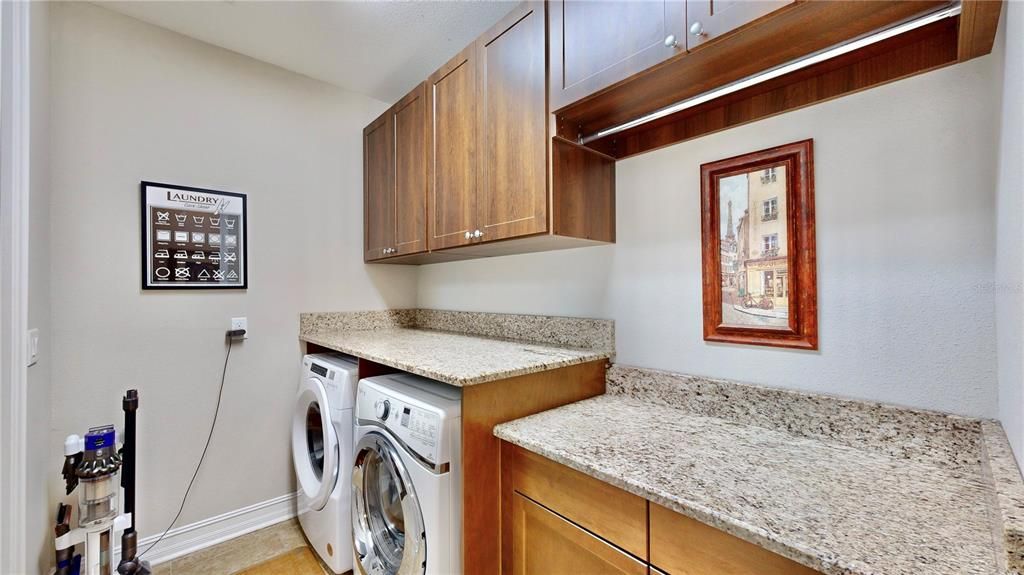 Full view of the bathroom with water closet in a separate closed in area