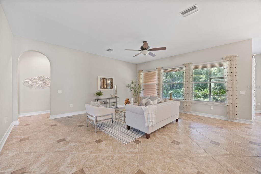 Inviting light and bright family room off of the primary bedroom