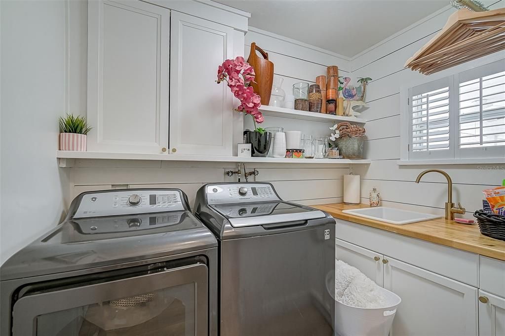 Laundry Room with Cabinetry & Sink