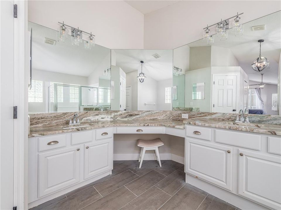 Primary bathroom with granite countertops