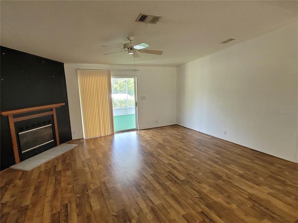 Living Room with Wood Burning Fireplace