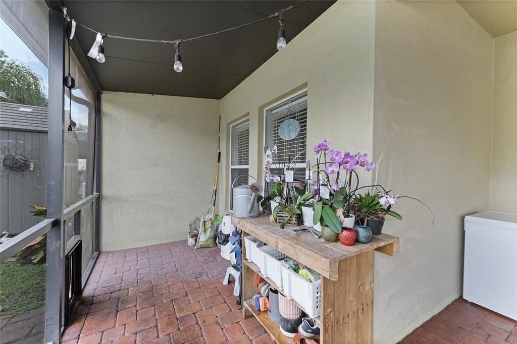 Screened-In Covered Patio with pavers