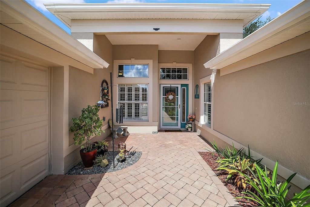 Beautiful Paver Covered  Entrance.