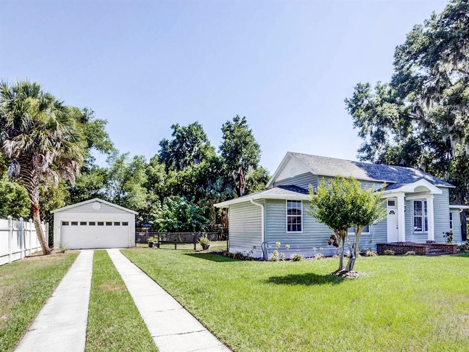 Home with detached garage.