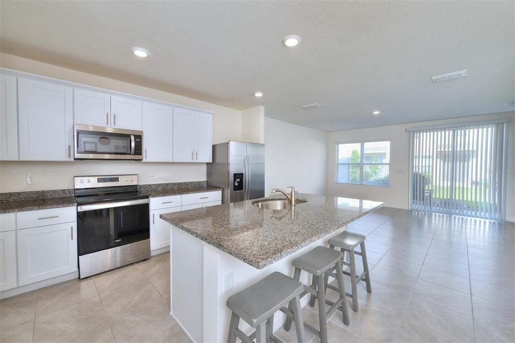 Kitchen, living room, and dining room