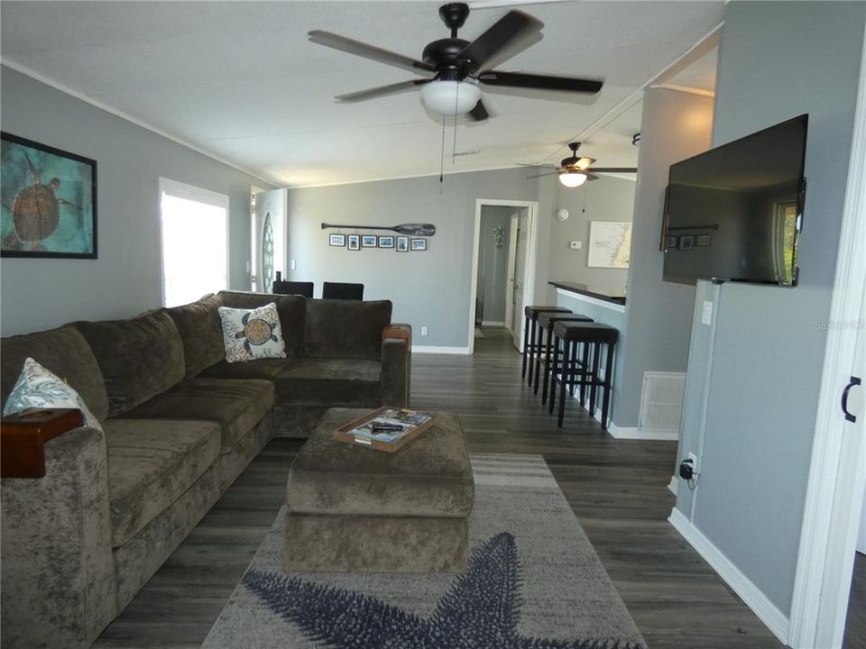 New water proof vinyl flooring throughout the home.