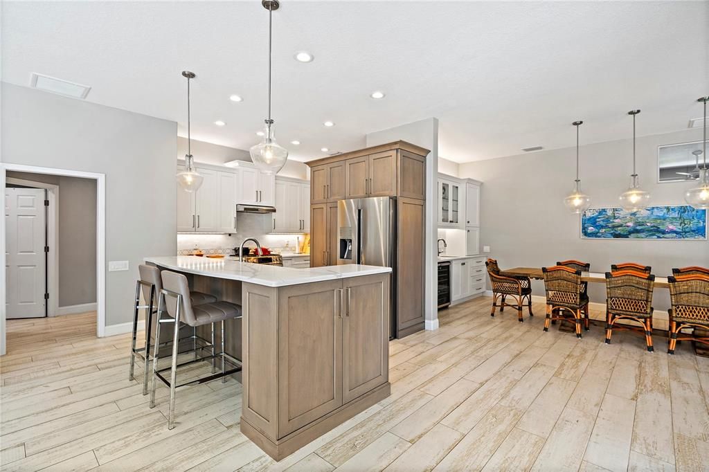 Large dining room with glass pendant lights