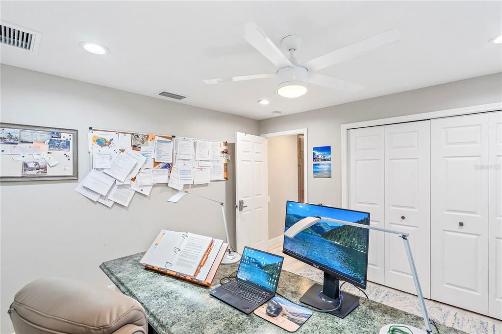 Bedroom #4. Big closets, beautiful flooring, lots of light. Owner has this as another office