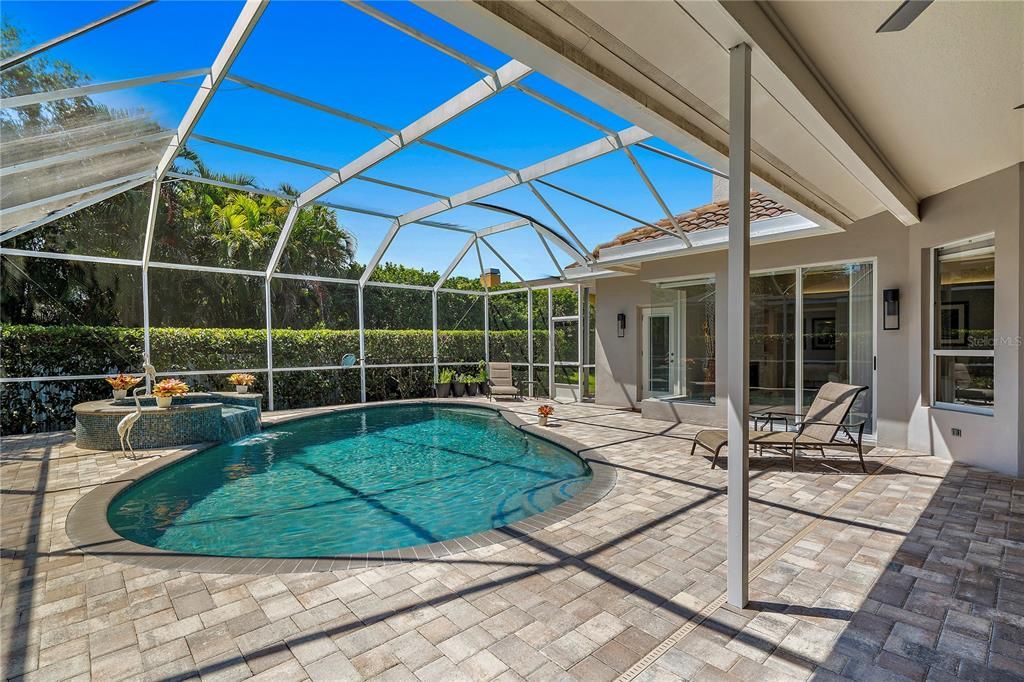 Large under roof entertaining, lounging area by pool. Great pavers!