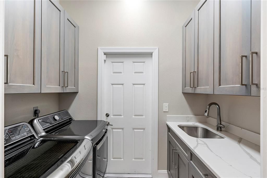 Great closets in bedroom that is being used as office.