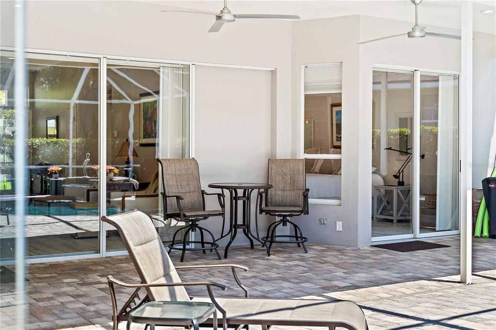 Large under roof entertaining, lounging area by pool. Great pavers!