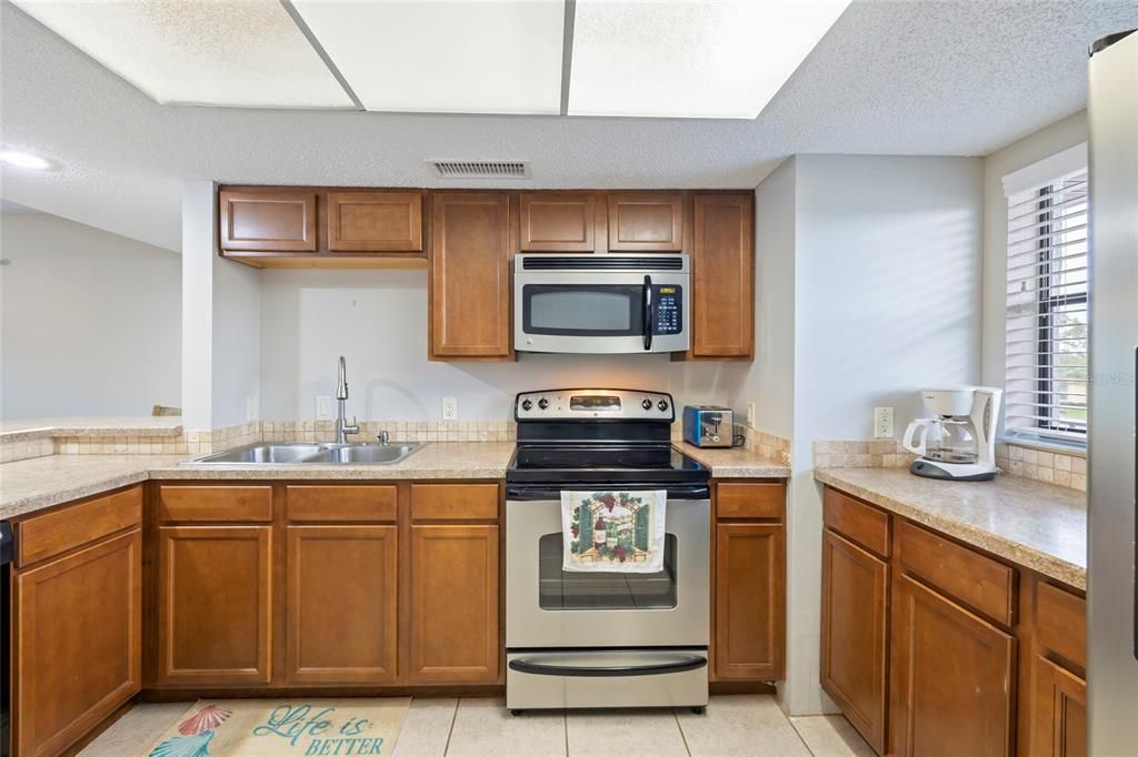 Kitchen....the Laundry area is behind the white folding door