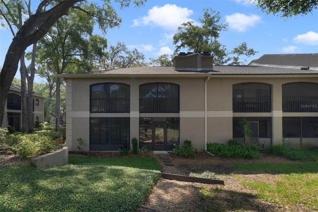 Rear of Condo Leads out to one of two pools