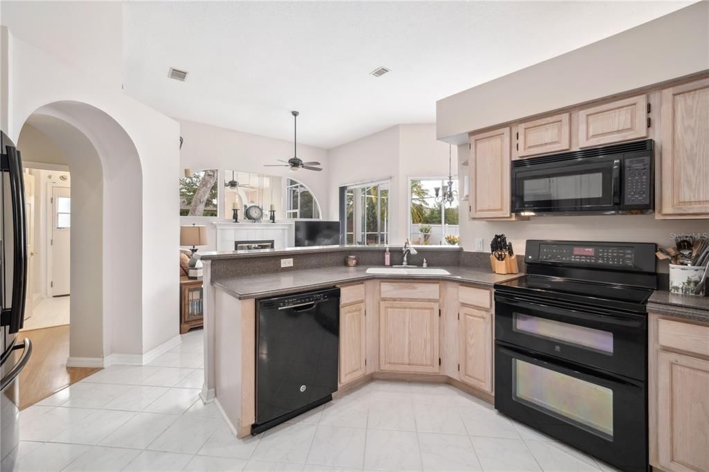 The kitchen opens to the family room