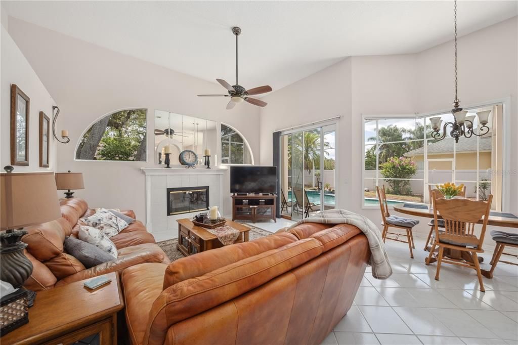 Breakfast bar flows between kitchen and family room