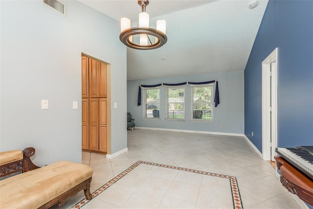 Dining room overlooking backyard and pool